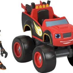 Figurka z "Blaze i mega maszyny zabawka" obok czerwono-czarnego monster trucka z płomieniami.